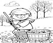 Printable boy rake pick up the leaves coloring pages
